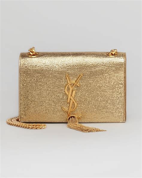 ysl tassel clutch gold